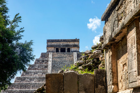 The amazing Kulkulcan pyramid at Chichen Itza, also known as the castle or temple of the Yucatan Peninsula in Mexico, is an old Mayan ruin.の写真素材