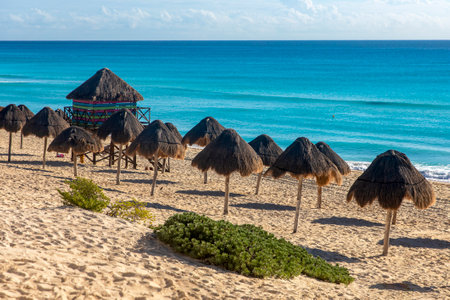 Panoramic picture of the dolphins beach on a sunny day in the hotel zone of Cancun Mexico. It is a tropical paradisiacal beach of white and golden Caribbean sand, very popular with tourists. vacationsの写真素材