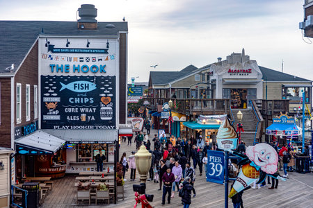 San Francisco, USA; January 9, 2023: Establishments and entertainment at Pier 39 of the Fisherman's Harbor in the city of San Francisco, in the state of California in the USA. American Conceptのeditorial素材