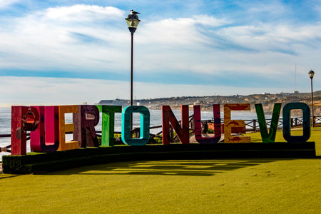 Puerto Nuevo, Mexico; September 10, 2023: Photograph of the Puerto Nuevo town sign on the shores of the Pacific Ocean, under the warm sun of Mexico's Baja California.のeditorial素材
