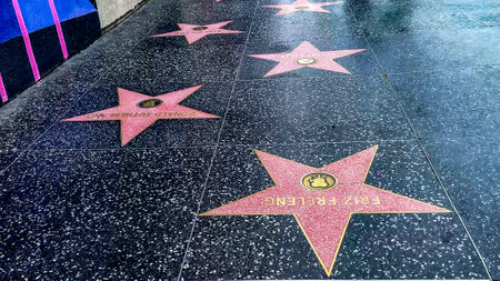 Los Angeles, California, USA; October 6, 2023: Several stars on the walk of fame in Los Angeles in...
