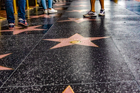Los Angeles, California, USA; January 15, 2023: The stars on the Los Angeles Walk of Fame, a place visited by tourists and movie stars on Oscar Day.のeditorial素材