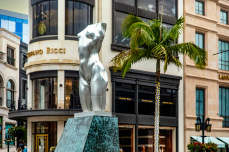 Los Angeles, USA; January 15, 2023: Sculpture of the torso of a woman in the middle of the luxurious street of Rodeo Drive in Beverly Hills in the city of Los Angeles, in California, United States.のeditorial素材