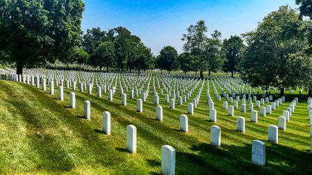 Rows of white marble tombstones at Arlington National Cemetery, the world's most famous military cemetery located in Washington DC, USA.の写真素材
