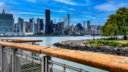 Strolling along the pier viewer and observer of Long Island is an island that extends from the east of New York City (USA).の写真素材