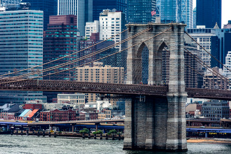 Brooklyn Bridge linking the boroughs of Manhattan and Brooklyn in New York (USA) this bridge is one of the most famous, well known and largest in the Big Apple.の写真素材