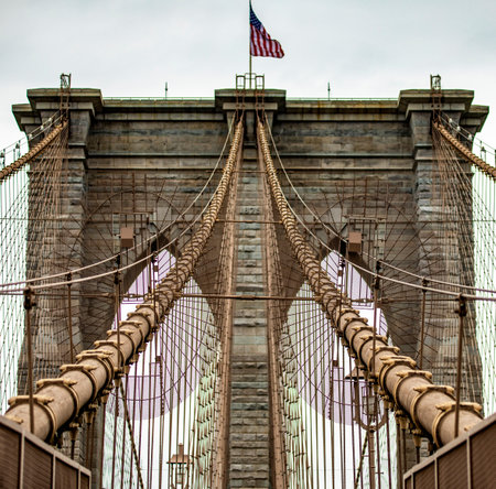 The incredible Brooklyn Suspension Bridge linking the boroughs of Manhattan and Brooklyn in New York City (USA), the largest suspension bridge in the world until 1889.の写真素材