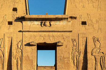 Explore the ancient temple of Horus in Edfu, a sacred sanctuary where the falcon god once resided. Immerse yourself in the rich history and mythology of ancient Egypt.の写真素材