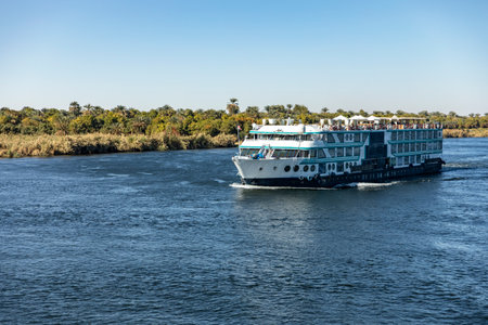 Escape to tranquility on a serene Nile River Cruise. Sail past ancient temples and lush landscapes, finding your oasis amidst the wonders of Egypt.の写真素材