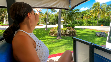 Embark on a Caribbean adventure in style. Cruise through the resort in a golf cart, soaking in the tropical ambiance and breathtaking views.の写真素材