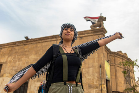 Capture a tourist enjoying the Alabaster Mosque, Saladin's medieval masterpiece in Cairo Citadel. Ideal for cultural and travel-themed projects.の写真素材