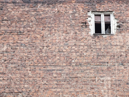 Window in a red brick wallの写真素材