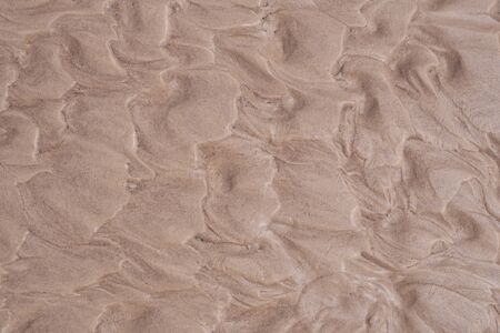 Wet brown sand nature texture for background