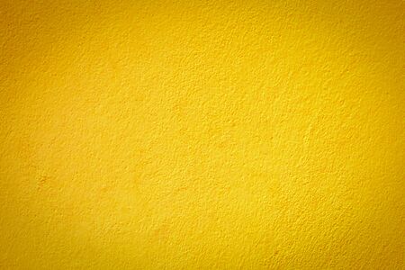 Beautiful yellow cement wall texture background. for designの写真素材