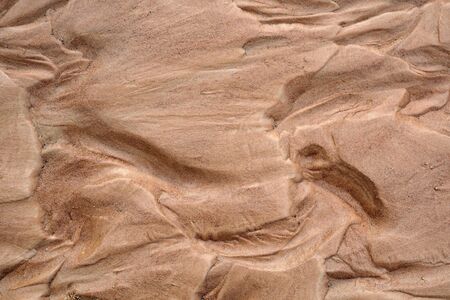 Wet brown sand nature texture background. top viewの写真素材
