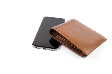 Smart phone and brown wallet on white backgroundの写真素材