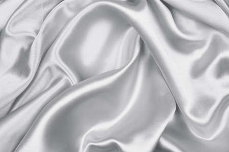 Smooth elegant gray silk or satin texture can use as abstract backgroundの写真素材