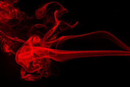 Red Smoke on black background. fire design and abstract artの写真素材