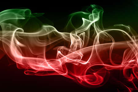 Abstract colorful smoke on black background and darkness concept, fire designの写真素材