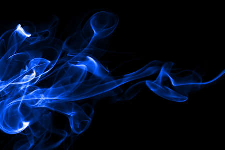 Blue smoke abstract on black background for design. darkness conceptの写真素材