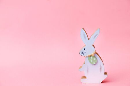easter bunny figure on pink background