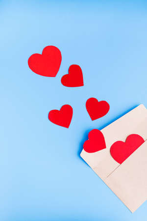Valentine's Day background. Hearts on pastel blue background. Valentines day concept. Flat lay, top...