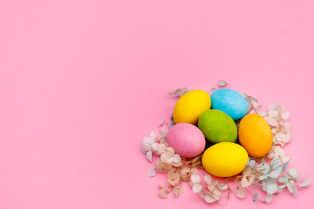 Easter bunny. Happy Easter holiday background concept.Flat lay colorful bunny egg with accessory to...