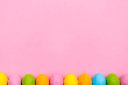 Easter bunny. Happy Easter holiday background concept.Flat lay colorful bunny egg with accessory to...
