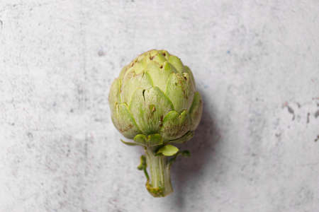 fresh artichokes on rustic gray backgroundの写真素材