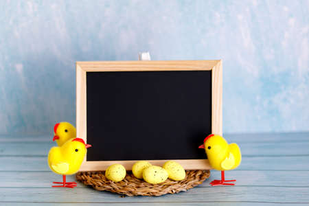 The minimal concept of Easter. An Easter card with a copy of the place for the text. Chicken and...