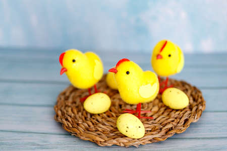 Beautiful blue easter background with chicks. Spring nature backdrop. Festive decorations. Cartoon...