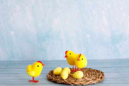Beautiful blue easter background with chicks. Spring nature backdrop. Festive decorations. Cartoon...