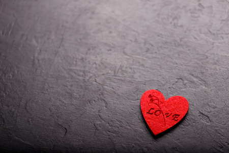 Beautiful valentines day background with red hearts on black background. Card for Valentine's Day. Love concept.の写真素材