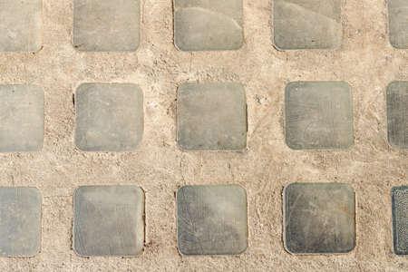 Abstract background of old cobblestone pavement close-upの写真素材