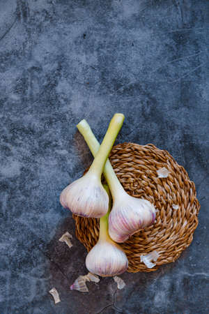 Fresh garlic.Close up of purple garlic bunch.の写真素材