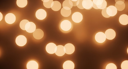 Golden lights scattered on a dark background, creating a bokeh effect