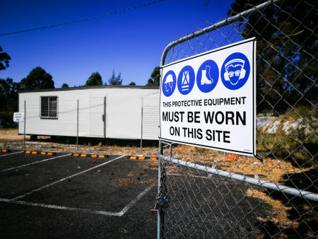 Warning sign construction site for must be worn this protective equipment on this site.の写真素材