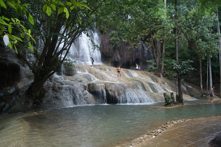Waterfall in forest. Rest on the summer nature.のeditorial素材