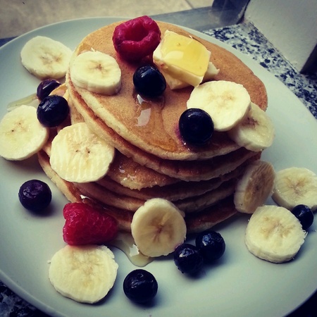 Homemade Maple Syrup Pancakes with Banana and Berriesの素材