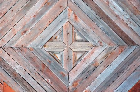 mosaic texture aging door from wooden boardsの写真素材