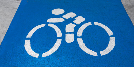 close up of bicycle signon blue background