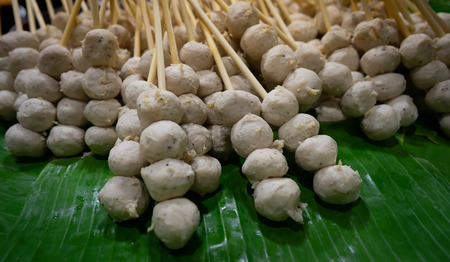 Raw porkball in the basket before cooking