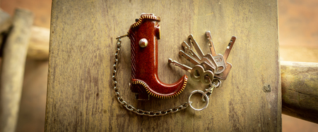 the cowboy boots keyring made from saw dust.の写真素材