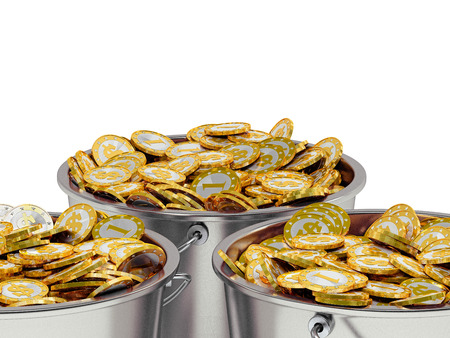 Golden Coins in a Bucketの写真素材