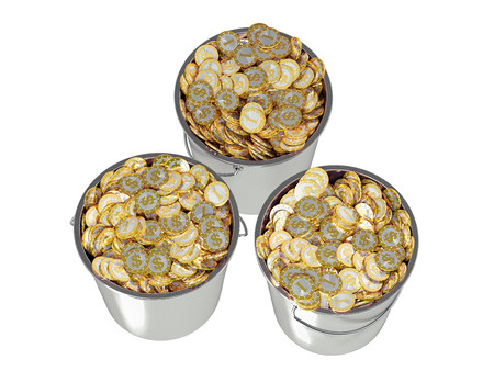 Golden Coins in a Bucketの写真素材