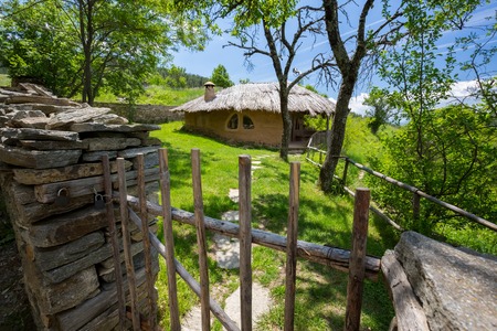 Street view at locked earthen clayey house in Leshten, Bulgaria like a fairy tale in the springの写真素材