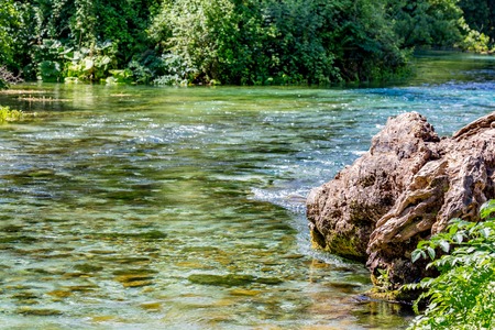Beautiful turquoise spring Blue Eye a.k.a. Syri i Kalter near the town of Muzine in Albania. The...