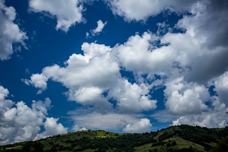 Spring season green landscape with scenery cloudscape from the region of Stara Planina mountain in...