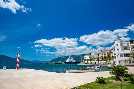 TIVAT, MONTENGRO - MAY 16, 2017: Luxury residential buildings are built at the seashore of Adriatic...