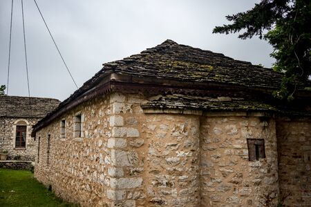 Street view, back apse church part, Ioannina island on lake Pamvotida near the beautiful small...